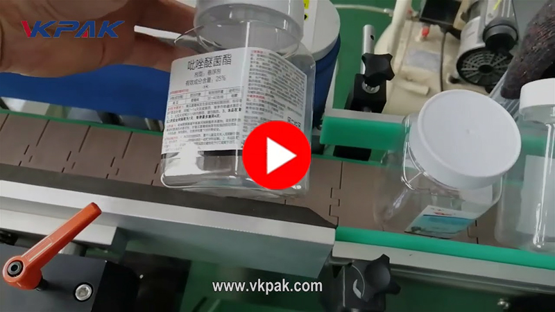 Automatische machine voor het aanbrengen van etiketten op vierkante flessen met meerdere zijden