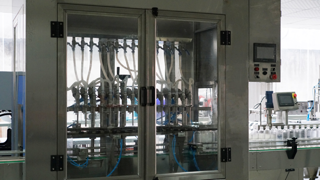 6 heads overflow filling machine overloop vulmachines.jpg