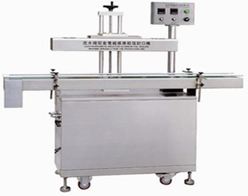 automatic aluminum foil sealing machine inductiefolie sealmachine.JPG