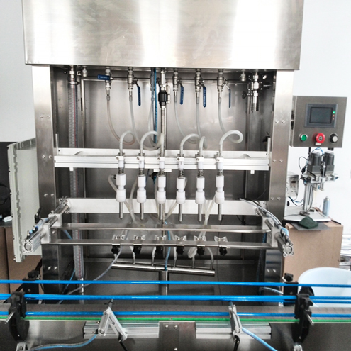 6 heads overflow filling machine overloop vulmachines.jpg