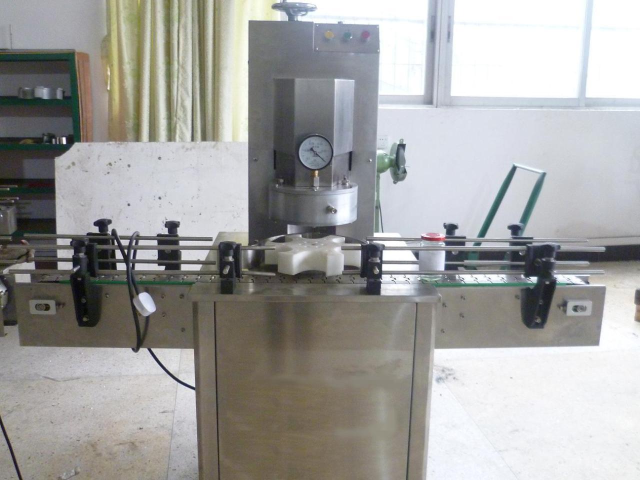 rotary glass jar vacuum capping vacuüm glazen pot.jpg