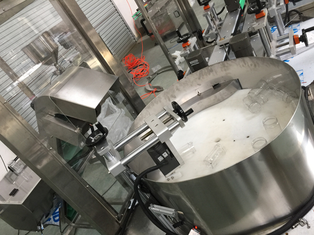 flessen ontwarren hefsysteem.jpg