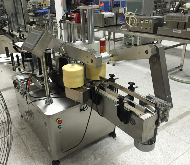 double side bottle labeling equipment double_face_fles_etiketteringsapparatuur.jpg