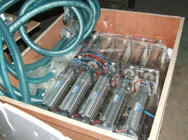 4-kops vulmachine in houten koffer.jpg