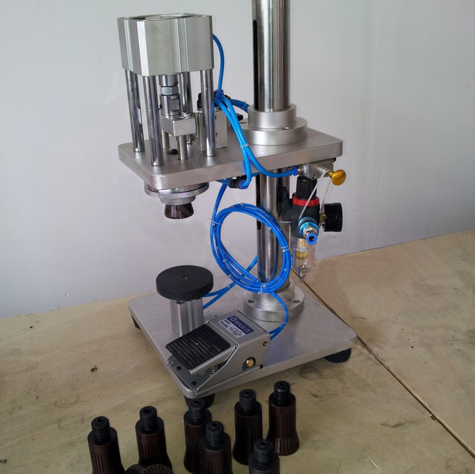 manual crimping machine for glass bottles pneumatische afsluitapparatuur semi-automatisch pneumatisch.jpg