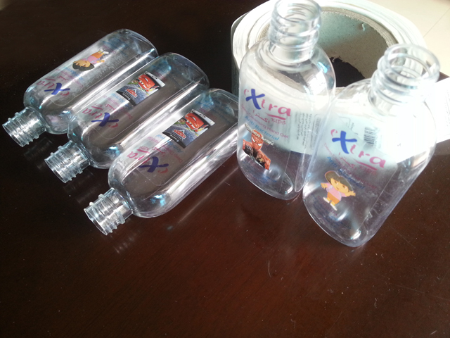 transparent labels labelled samples bottles plane surface Mrwan voorbeeld transparante etiketten en flessen (3).jpg