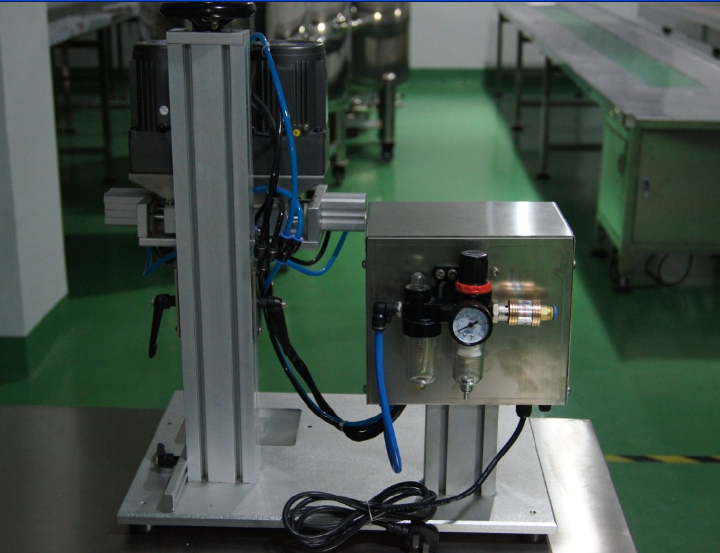 back shot of tabletop capping machine desktop schroefdopmachine.jpg