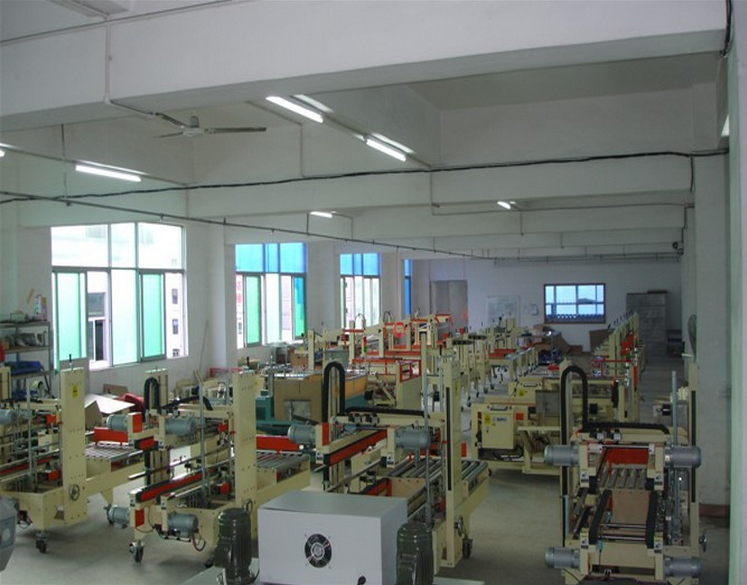 semi automatic carton sealing equipment semi-automatische dozensluitmachine.jpg