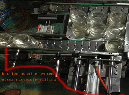 automatic bottles pushing system after filing flessenduwsysteem.jpg